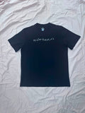 Black basic Tee with arabic text embroidered on chest and small logo embroidered on back below neck